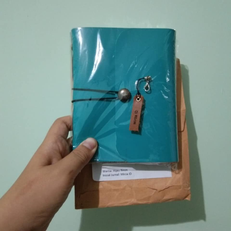 Hibrkraft User Generated Content Blue Notebook Held