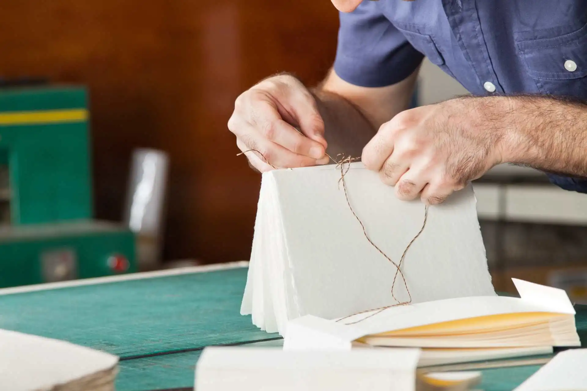 At Artisan Hand Repairing Book