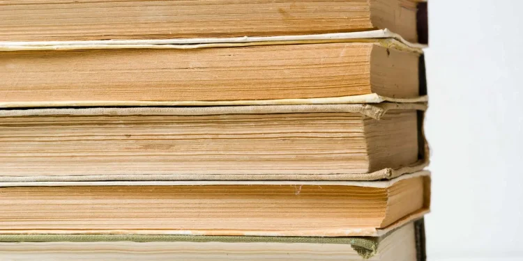 Be Affectionate Holding Damaged Book