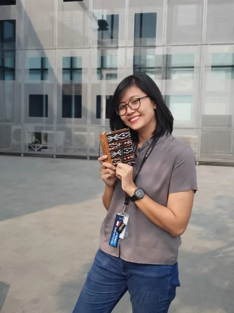 Hibrkraft Woman Holding Custom Leather Notebook 1