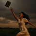 Woman Reaching Book