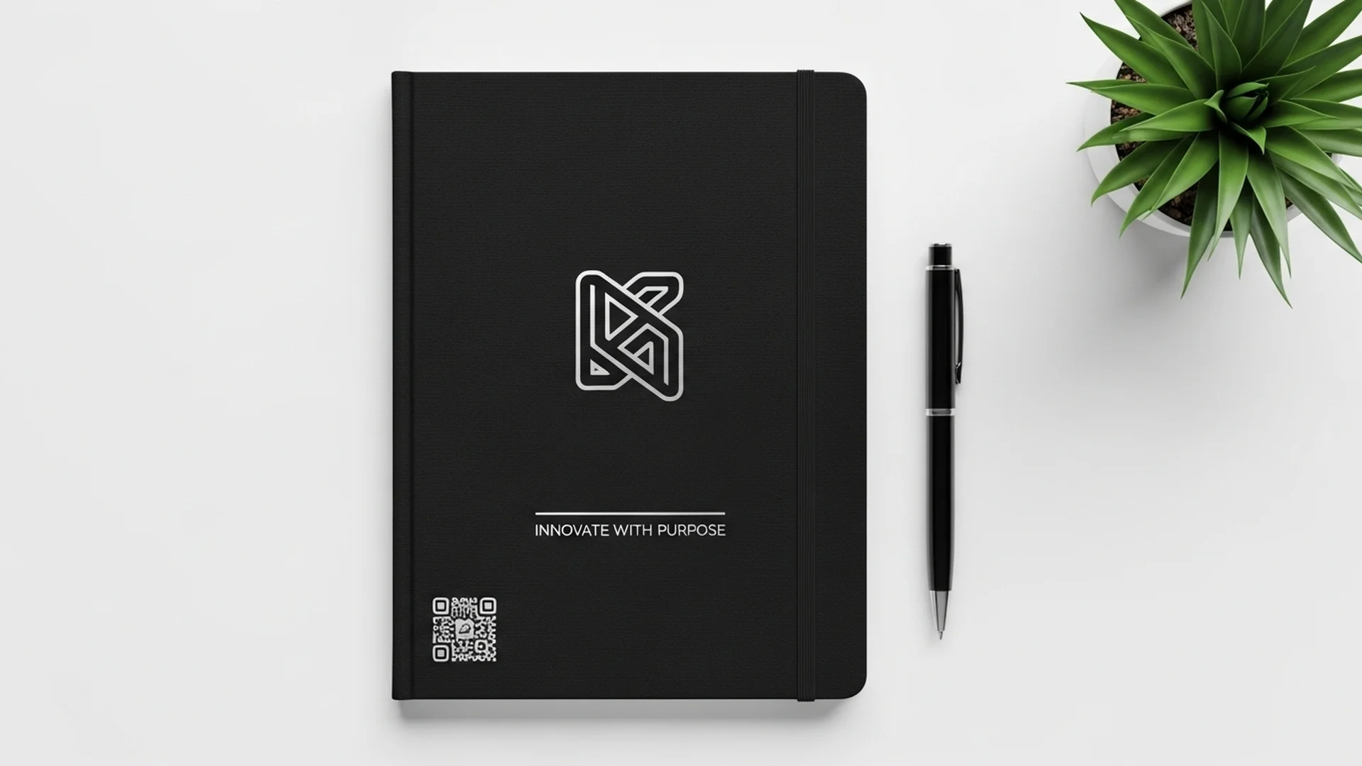 Black Notebook With Logo Pen Plant