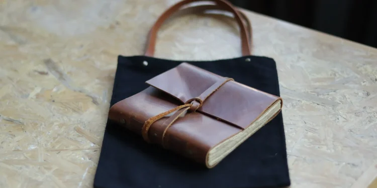 Brown Leather Journal In Black Canvas Tote Bag 1