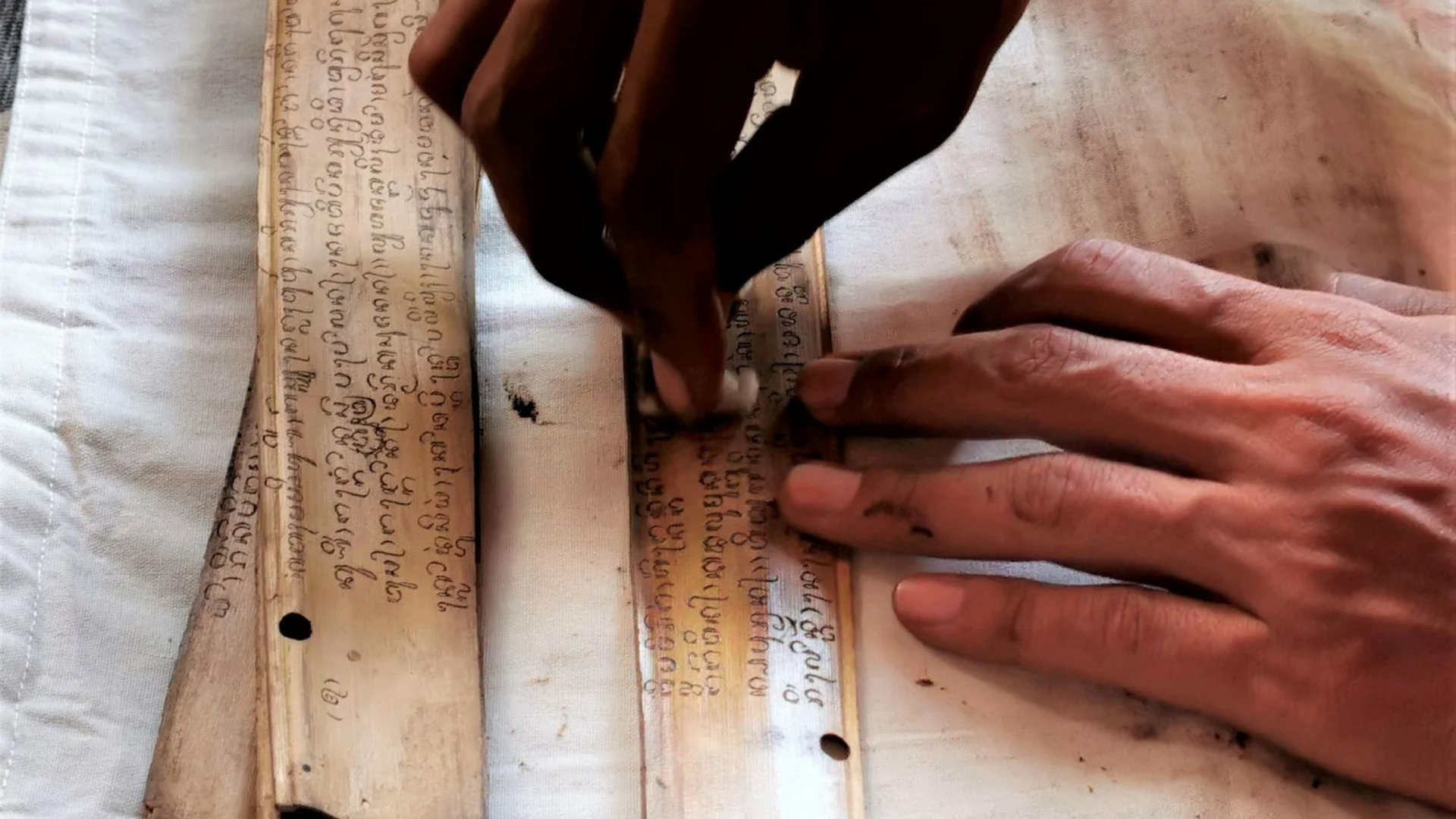 Cleaning Ancient Palm Leaf Manuscript