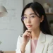 Woman With Glasses In Office Setting