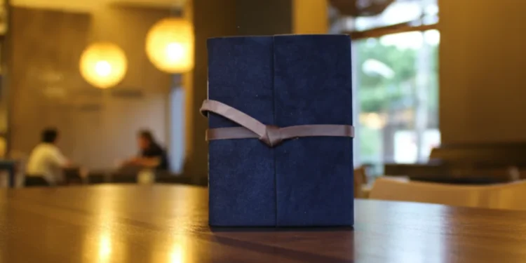 Restaurant Menu On Wooden Table