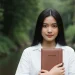 Woman Holding Notebook Nature Portrait