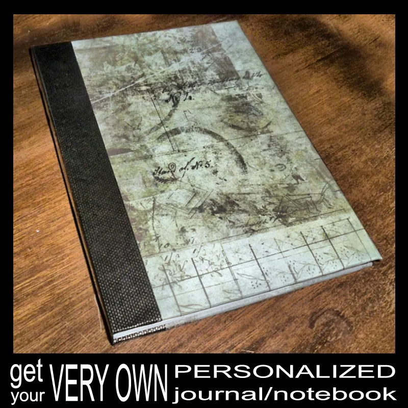 A notebook covered in an old-map pattern with a dark cloth spine