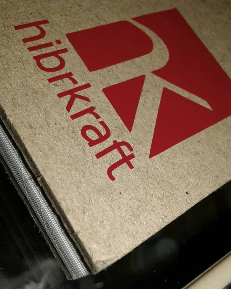 The Hibrkraft logo on card printed with Juno
