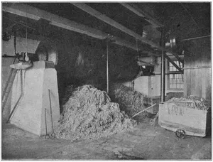 BOILER ROOM, CRANE & CO. The contents of the rotary boiler have been emptied upon the floor. The next step is to wash and bleach.