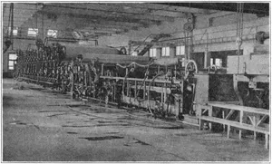 FOURDRINIER MACHINE, S. D. WARREN & CO. View showing the “Fourdrinier” part of a modern book paper-machine.