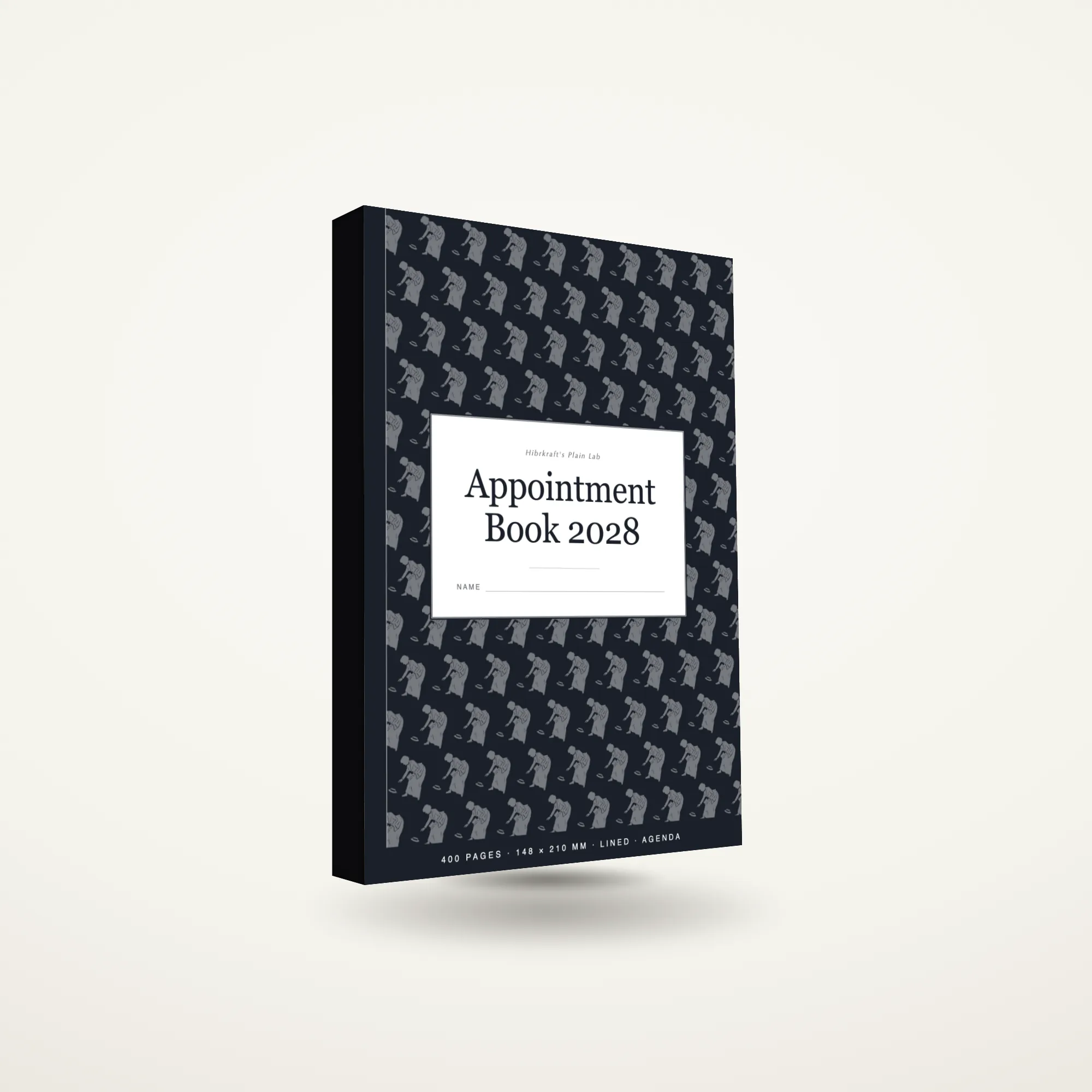 A5 Appointment Book 2028 standing closed on a plain surface, cover carrying a silhouette-figures motif, roughly twenty-four millimetres thick.