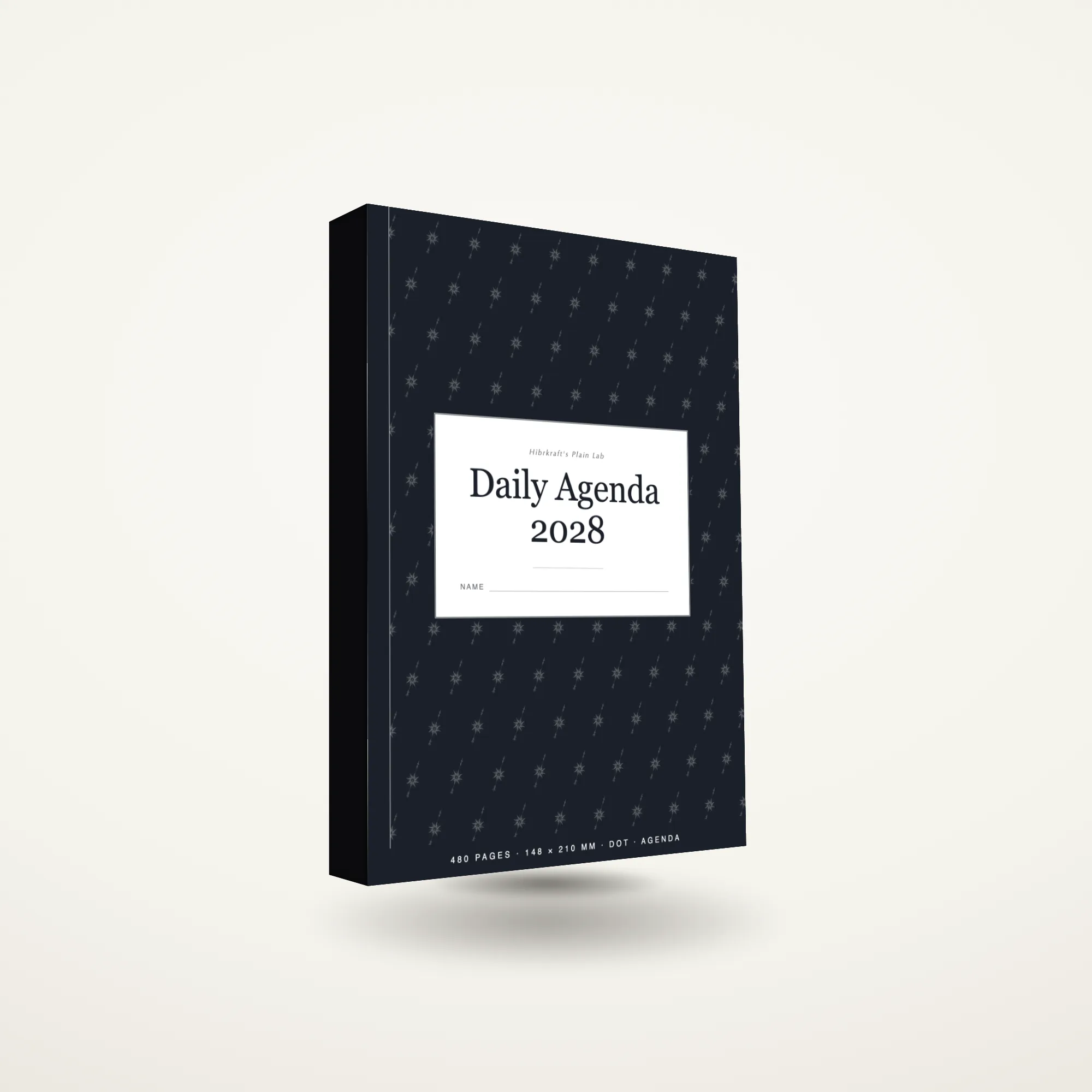 A5 Daily Agenda 2028 standing closed, matte cover, noticeably thick against a plain surface, about 27.46 mm across the spine.