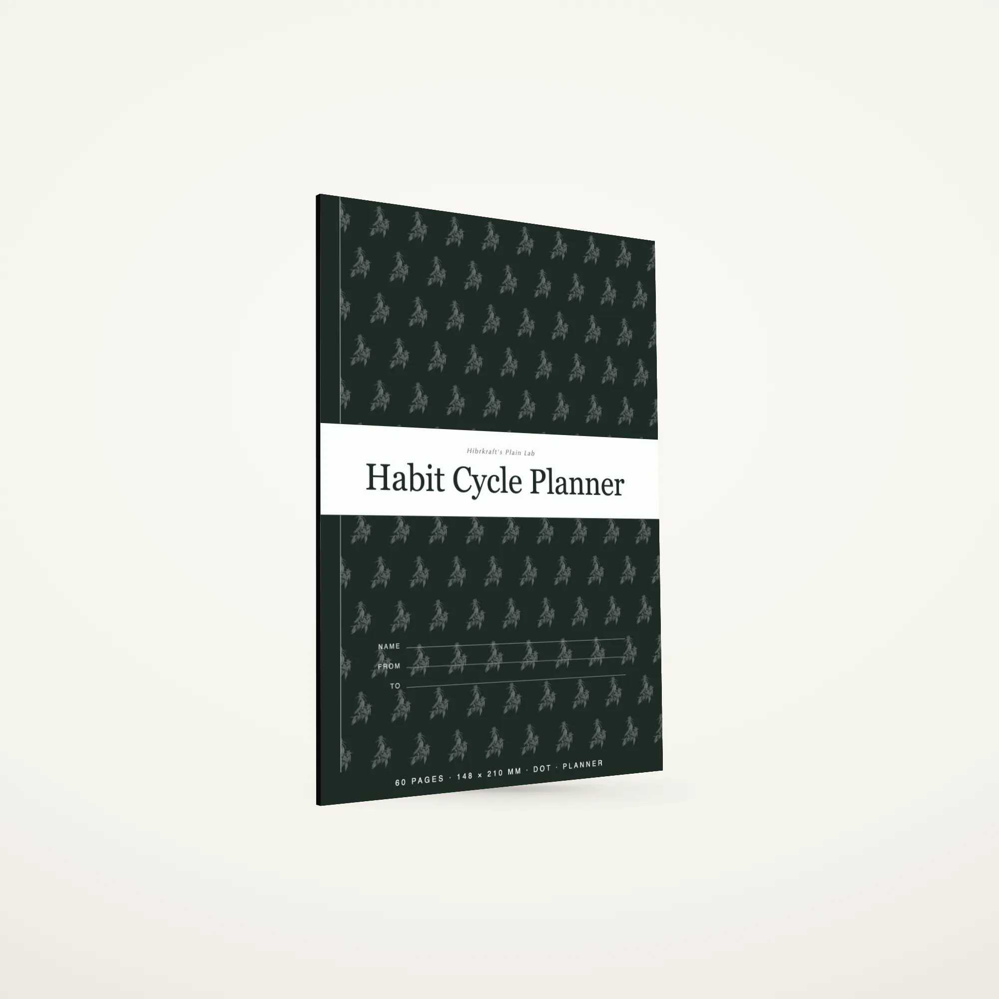 Habit Cycle Planner A5 berdiri tertutup, sampul berpita hijau sage gelap dengan motif botani dicetak terbalik nyaris putih, tebal sekitar tiga setengah milimeter.