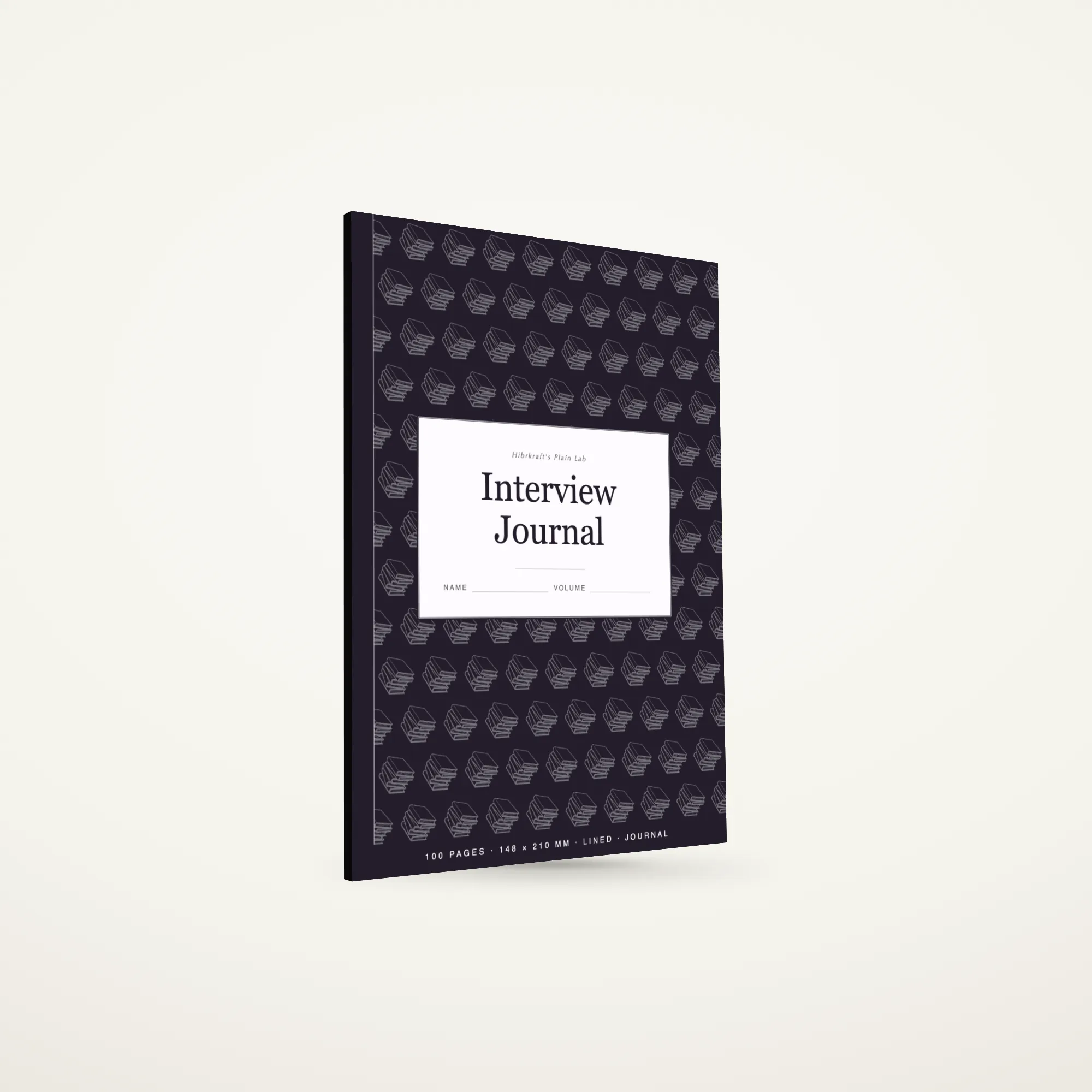 Closed a5 Interview Journal standing on a plain surface, a tiled illustration field on the cover, a cream label plate near the middle, a narrow binding strip down the spine.