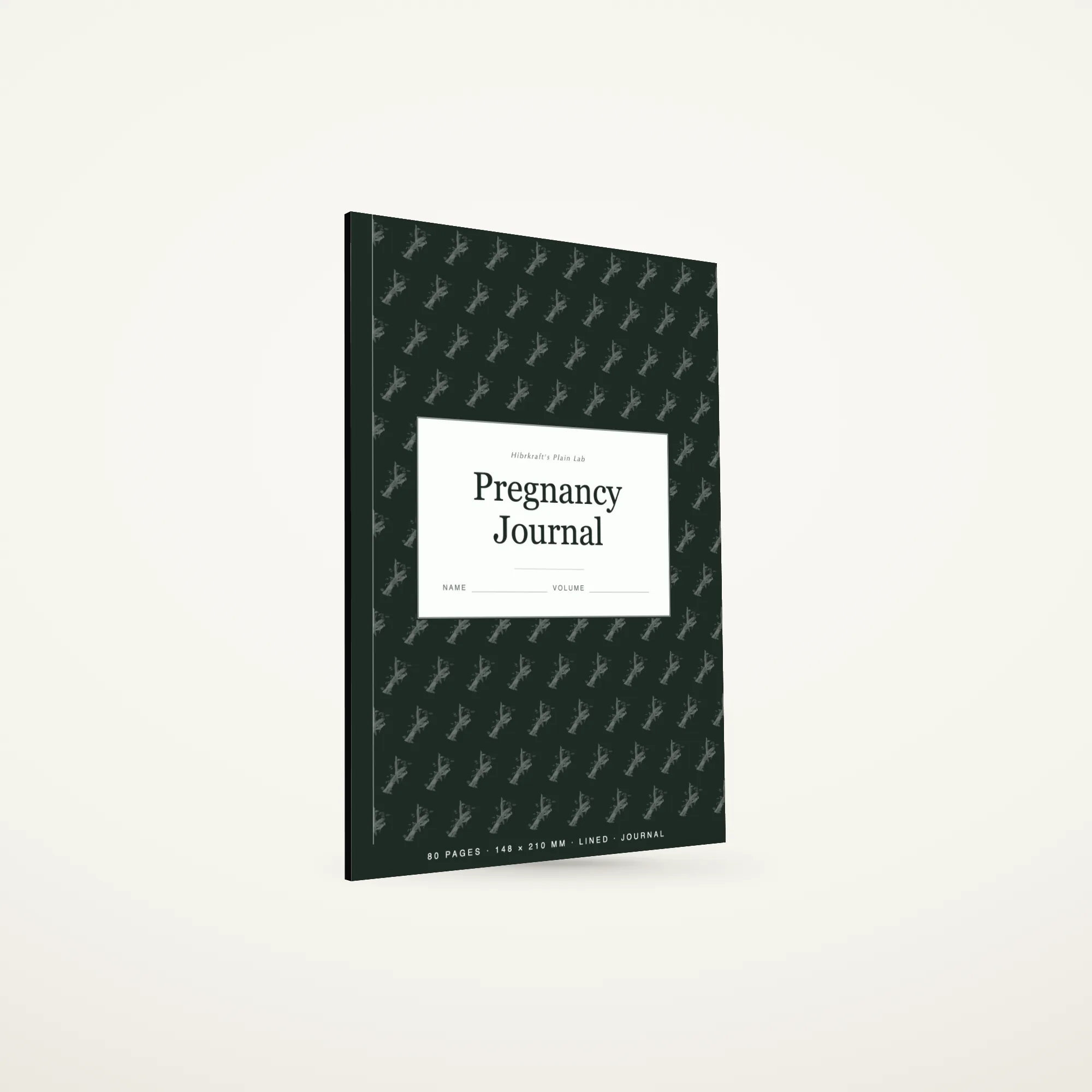 Pregnancy Journal A5 berdiri tertutup di atas permukaan polos, sampul lembut dengan motif botani, tebal sekitar lima milimeter.