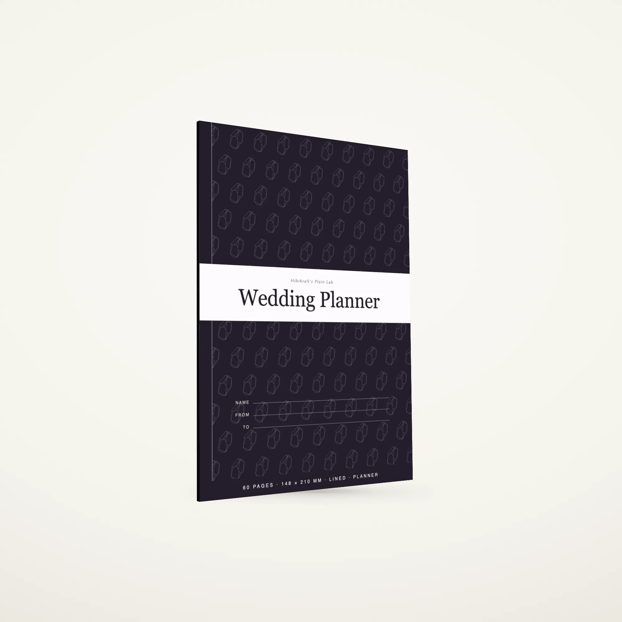 Wedding Planner A5 berdiri tertutup di atas permukaan polos, sampul berpita melintang di sepertiga bawahnya dengan judul dicetak terbalik, tebal sekitar tiga milimeter.